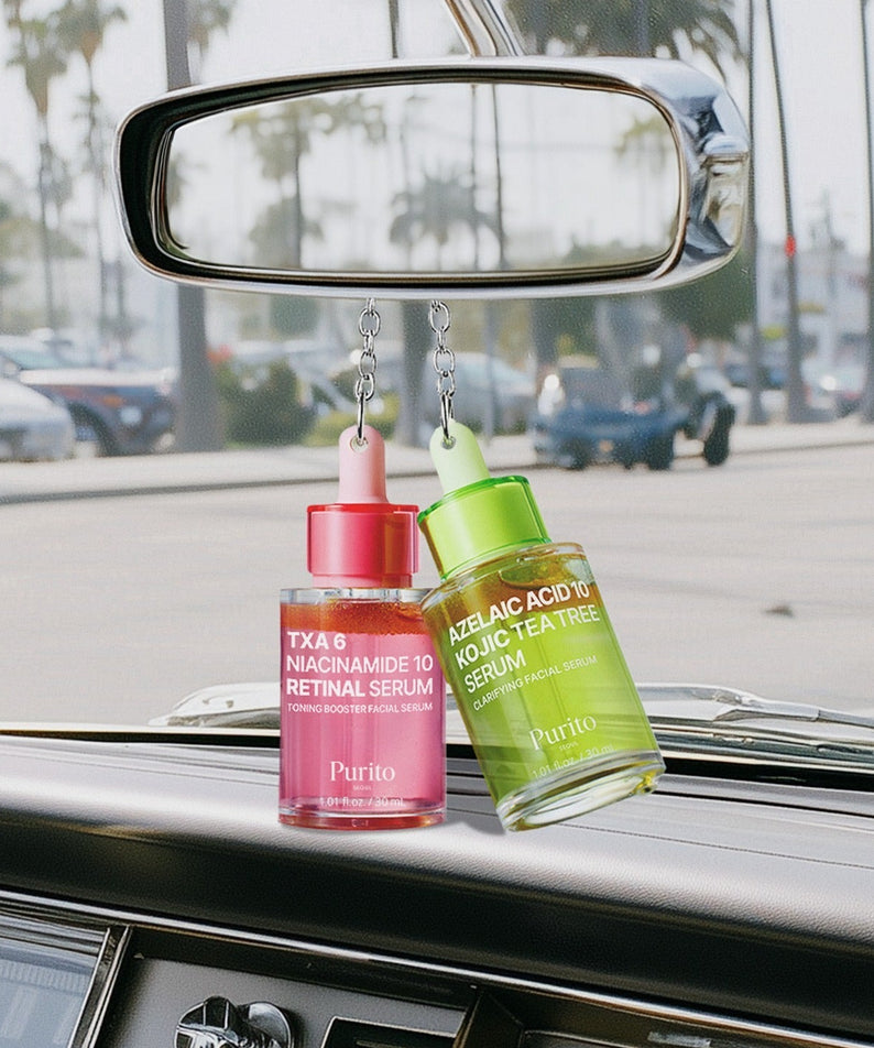 PURITO Tranexamic Acid 6 Niacinamide 10 Retinal Serum 30ml, flacons en vitrine voiture en extérieur, marque Purito.