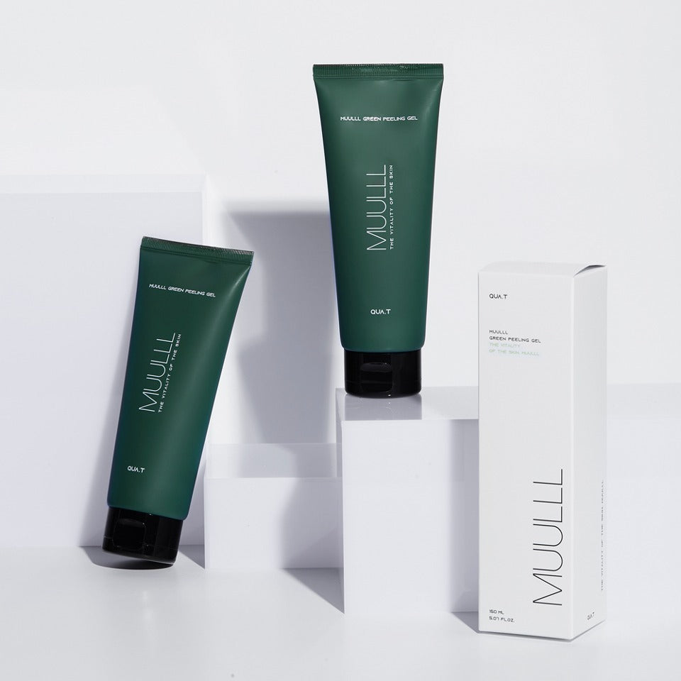 QUA-T Green Peeling Gel 150ml de la marque QUA-T, tubes verts sur fond blanc (photo produit)