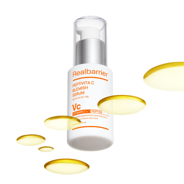REAL BARRIER Peptivita C Blemish Serum 30ml de la marque Realbarrier, flacon sur fond blanc avec gouttes jaunes.