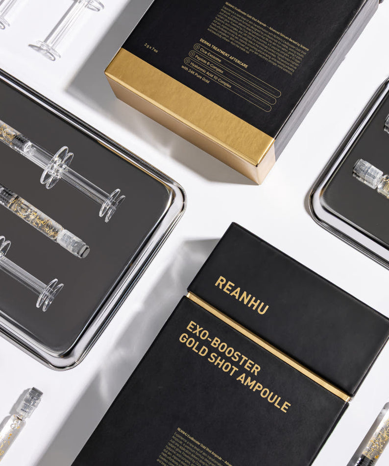 REANHU Exo Booster Gold Shot Ampoule 2 g X 7 ea, marque REANHU, flacons dorés sur fond blanc, vue packshot.