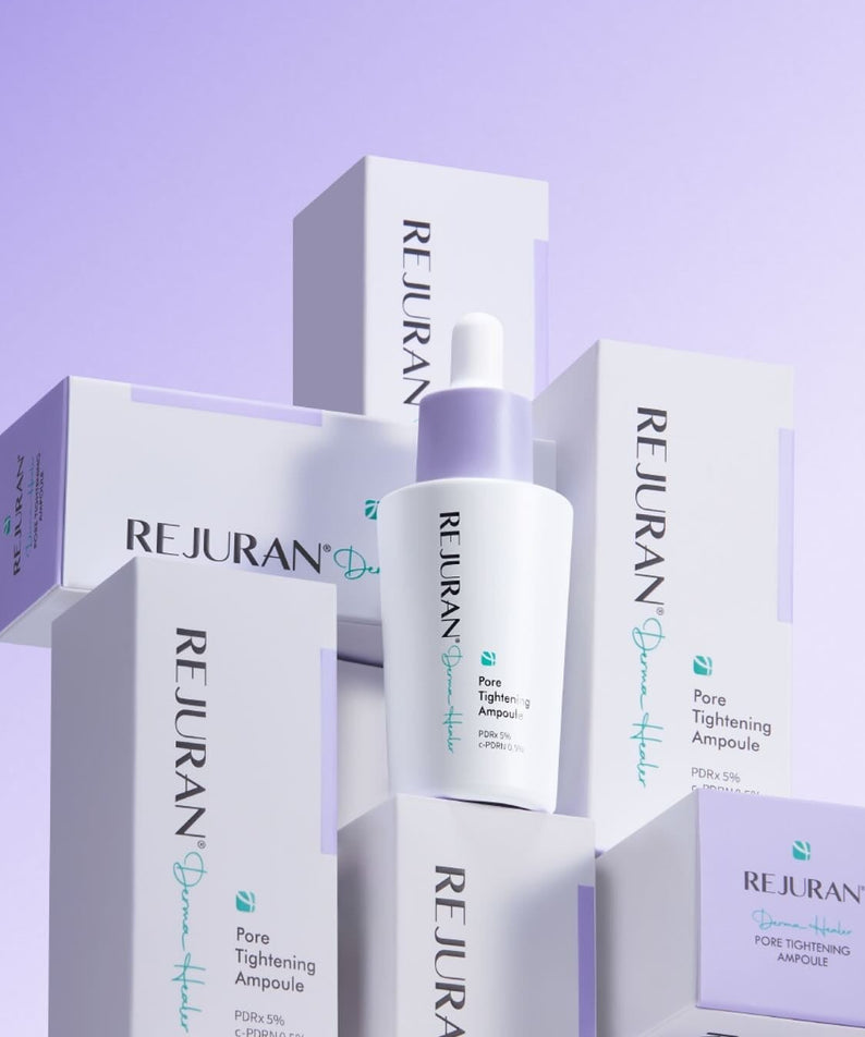REJURAN Derma Healer Pore Tightening Ampoule 30ml de la marque REJURAN, flacons sur fond violet pastel, produit en gros plan.