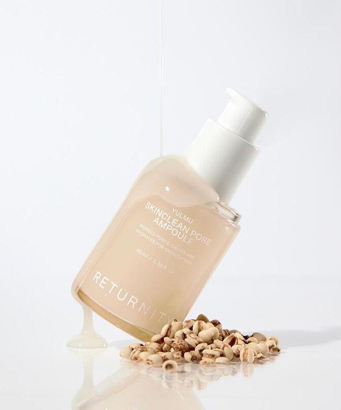 RETURNITY Yumu Pore Ampoule 40ml avec flacon pompe, présenté avec des grains, soin de la peau efficace.