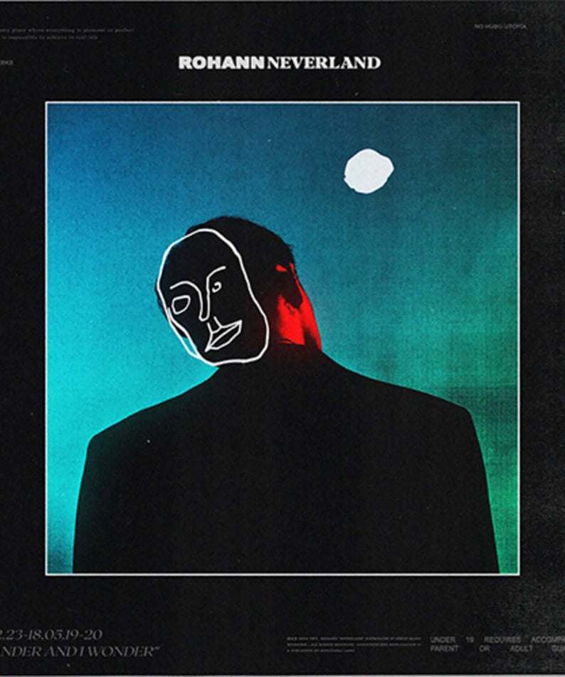 ROHANN - [NEVERLAND] - Album Kpop : visuel cover sombre avec portrait, étoiles et couleurs bleu/vert, pochette du groupe.