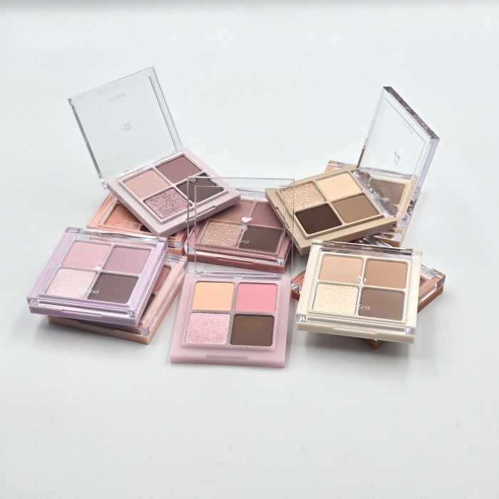 ROMAND  Romand Better Than Eyes, palette maquillage yeux sur fond clair avec compartiments de fards ouverts