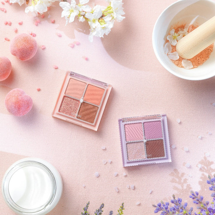 Décris l'image en français : ROMAND  Romand Better Than Eyes, palette maquillage pour les yeux sur fond pastel floral.