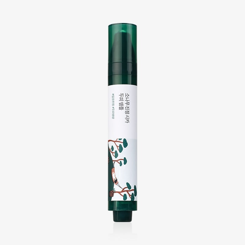 ROUND LAB  Pine Soothing Cica Scalp Ampoule 15ml, flacon vert et blanc sur fond clair, marque ROUND LAB, sérum apaisant.