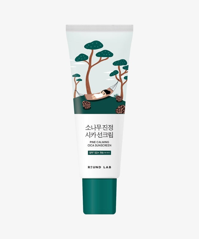Tube de crème solaire ROUND LAB Pine Calming Cica Sunscreen 40ml avec illustration apaisante de pin.