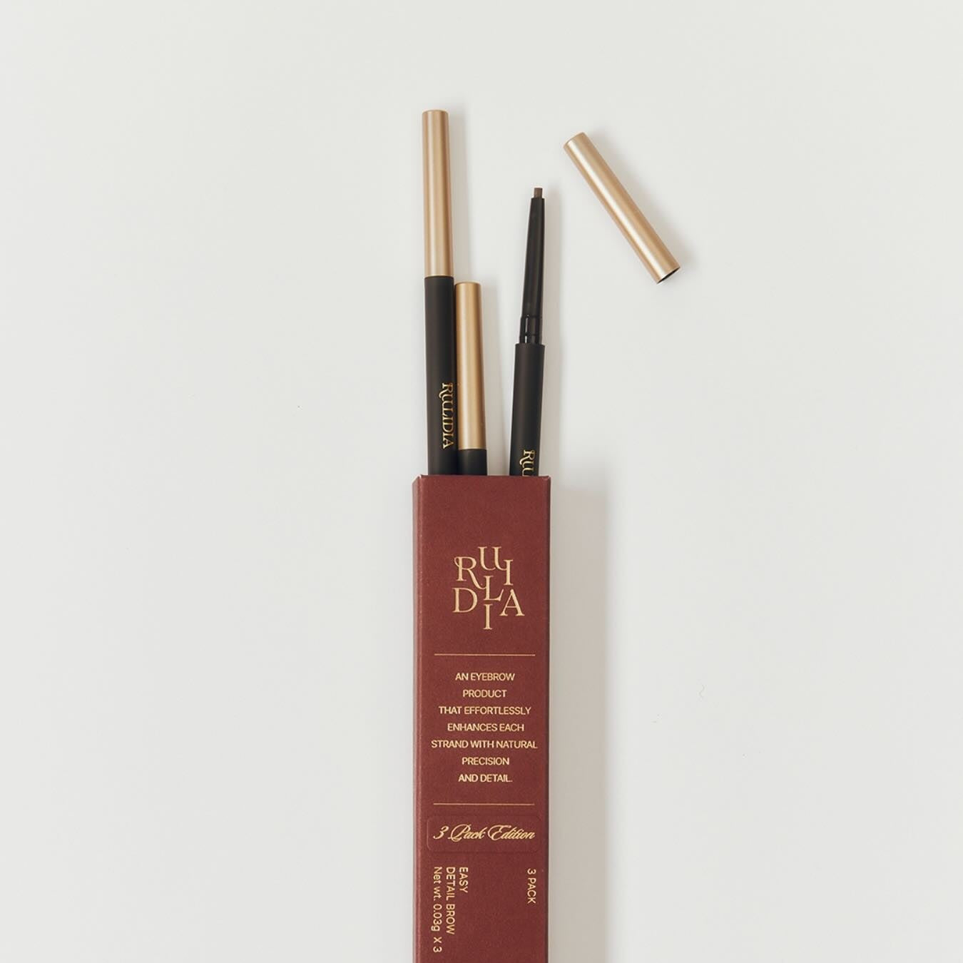 RULIDIA Easy Detail Brow de la marque RULIDIA, sur fond clair, avec applicateur et tube pour sourcils.