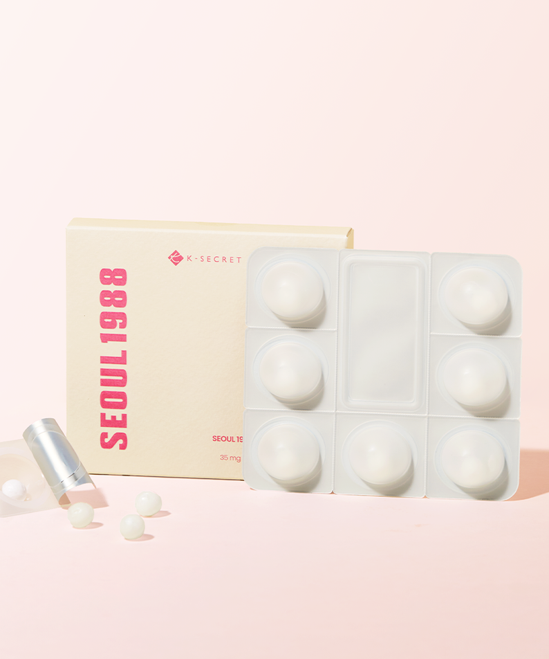SEOUL 1988  Collagen Boosting Ball de K-Secret, pack et billes cosmétiques sur fond rose, photo produit.