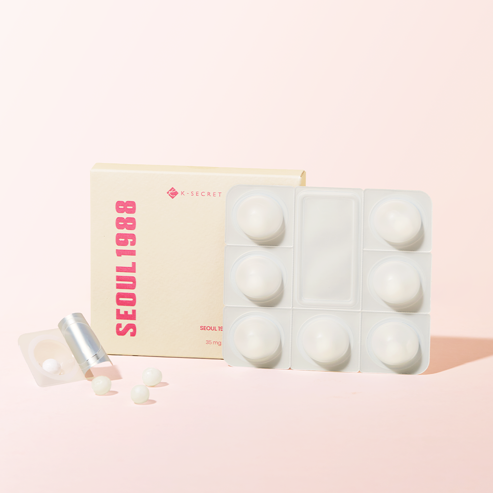 SEOUL 1988  Collagen Boosting Ball de K-Secret, pack et billes cosmétiques sur fond rose, photo produit.
