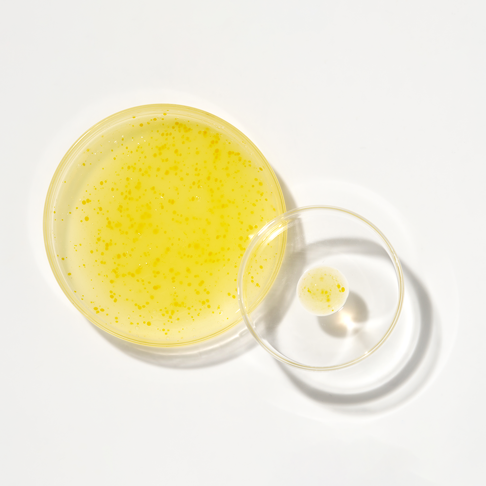 SEOUL 1988  Niacin Yuja Serum 30ml, sérum yuja et niacinamide sur fond blanc, flacon et goutte, photo produit