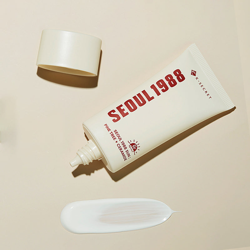 SEOUL 1988 Pine Sunscreen 50ml de la marque SEOUL 1988 : tube et texture crème sur fond clair, contexte visuel produit.