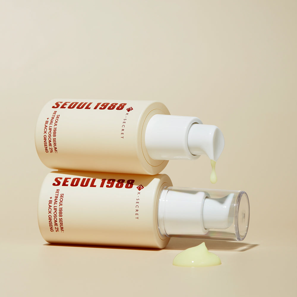 SEOUL 1988 Retinal Black Ginseng Serum 30ml : flacons et texture crème sur fond clair, marque SEOUL 1988 en évidence.