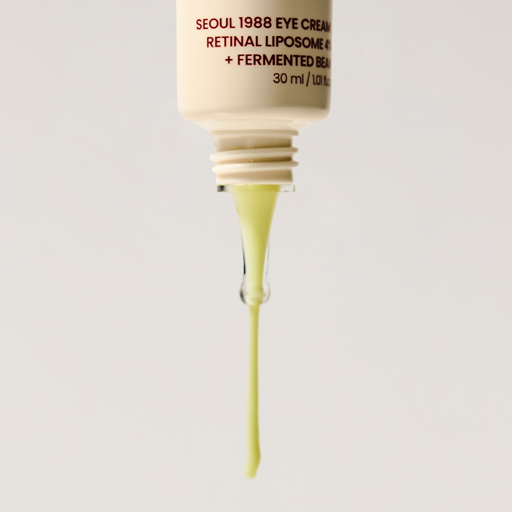 Décris l'image en français : SEOUL 1988 Retinal Fermented Soybean Eye Cream 30ml, crème contour des yeux, tube pressé sur fond clair.