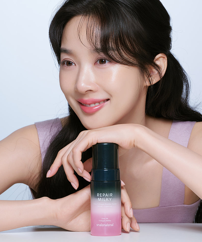 SHAISHAISHAI Repair Milky Urea Glow Bubble Serum 100ml : bouteille sur fond clair, femme asiatique en studio, ambiance beauté