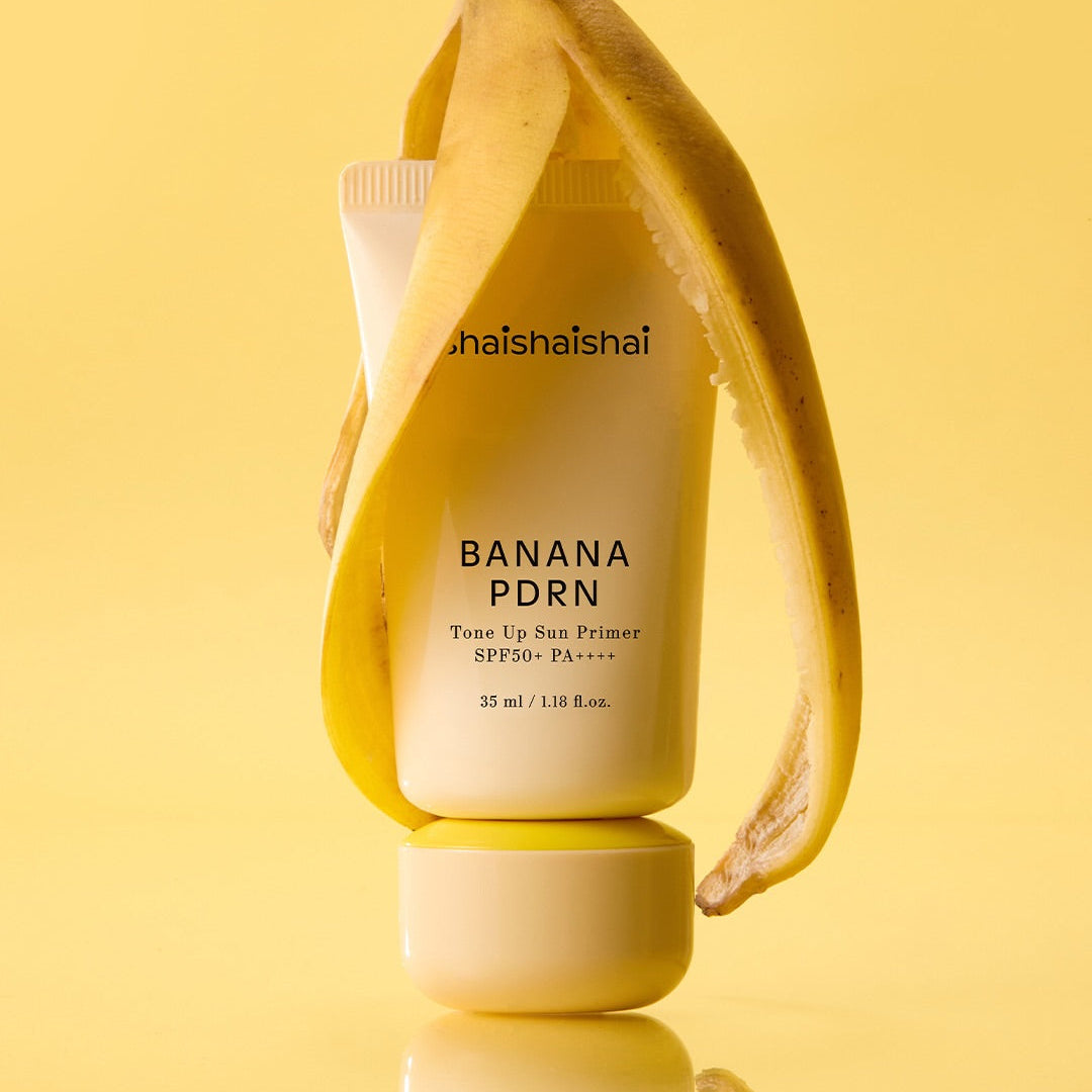 SHAISHAISHAI Banana PDRN Tone-Up Sun Primer 35ml, photo produit sur fond jaune ensoleillé, style cosmétique.