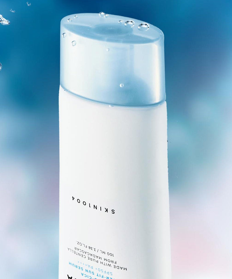 SKIN1004 Madagascar Centella Hyaluronic Acid Water-Fit Sun Serum 100ml, flacon blanc bleu, gouttes d’eau, visuel skincare