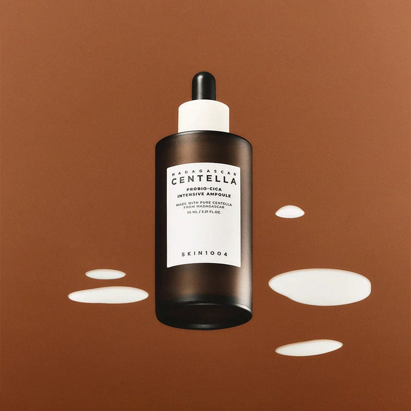 SKIN1004 Madagascar Centella Probio-cica Intensive Ampoule 50ml de la marque SKIN1004, flacon noir sur fond orange
