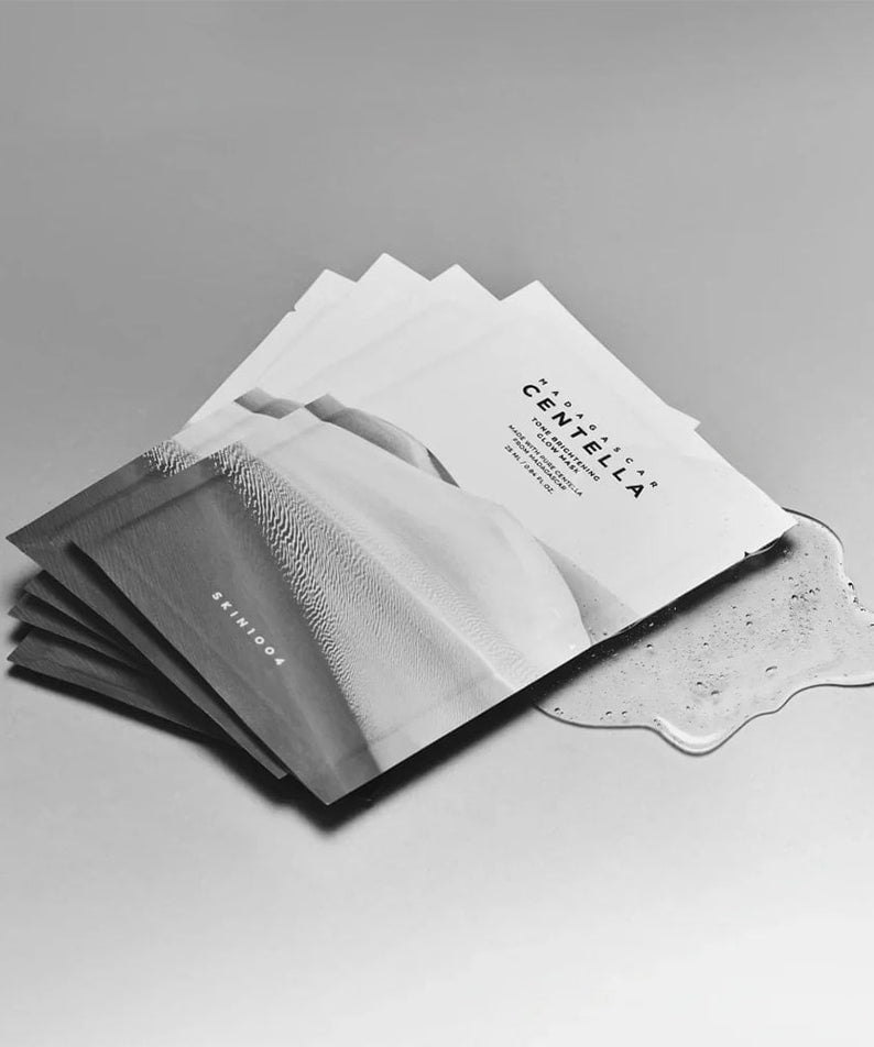 Masque SKIN1004 Madagascar Centella Tone Brightening Glow 25ml [5 sheets] pour éclat lumineux et hydratation de la peau.