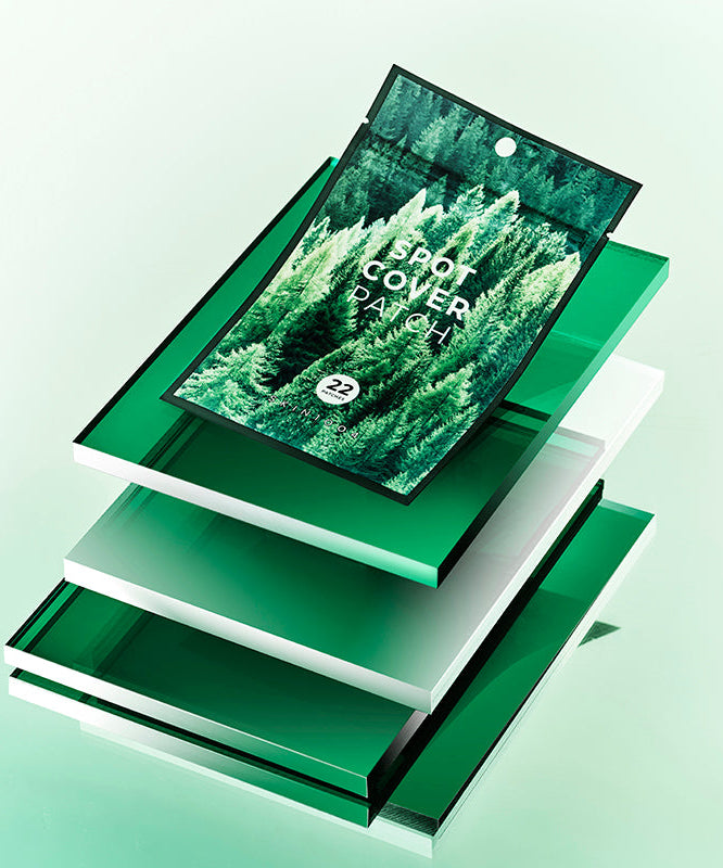 Emballage du produit SKIN1004 Spot Cover Patch 22patch sur fond vert, idéal pour le soin des imperfections de la peau.