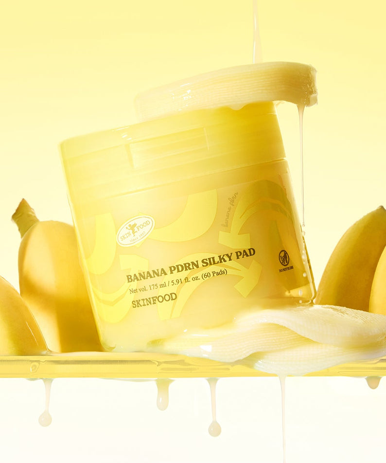 SKINFOOD Banana PDRN Silky Pad 60 sheets de SKINFOOD, en packaging jaune avec bananes, sur fond clair.