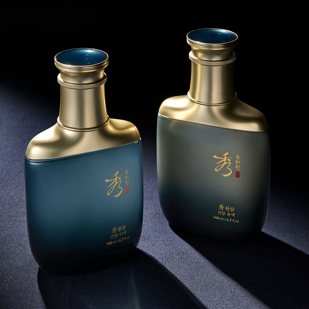 SOORYEHAN Cheonsam Geonyang Sap 140ml, deux flacons dorés et bleus sur fond sombre, marque SOORYEHAN visible.