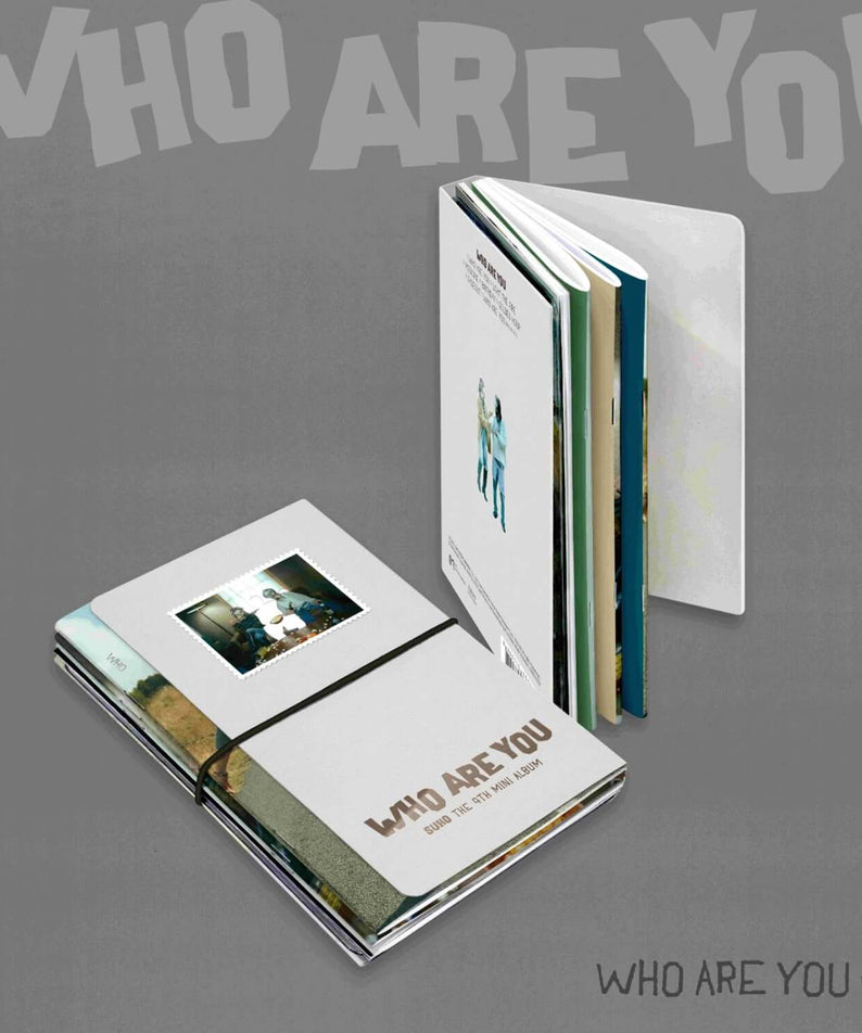 SUHO - 4th Album [Who Are You] (Who Are You Ver.) - Album Kpop : boîtiers dépliés sur fond gris, visuel éditorial.