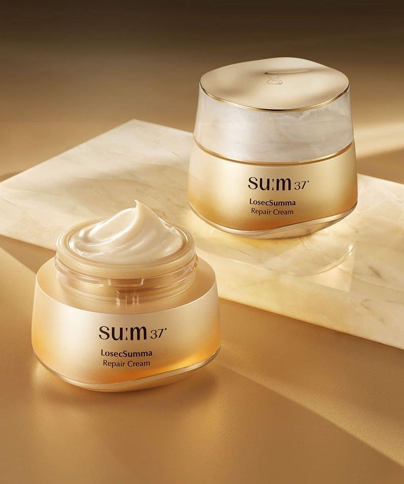 SU:M37 LosecSumma Repair Cream 50ml, crème visage en pot sur fond beige, lumière douce, produit SU:M37