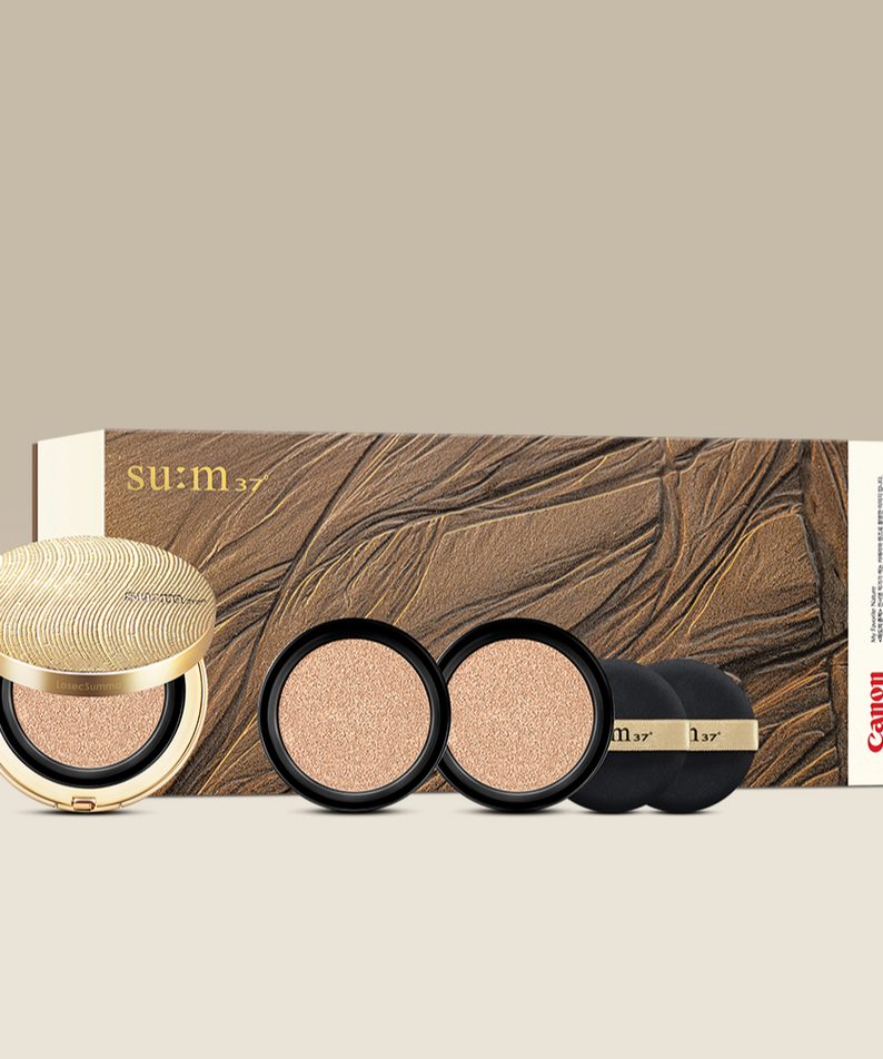 SU:M37 Summa Elixir Golden Cushion Project (with Canon Collaboration) - produit de luxe avec coques dorées et deux recharges