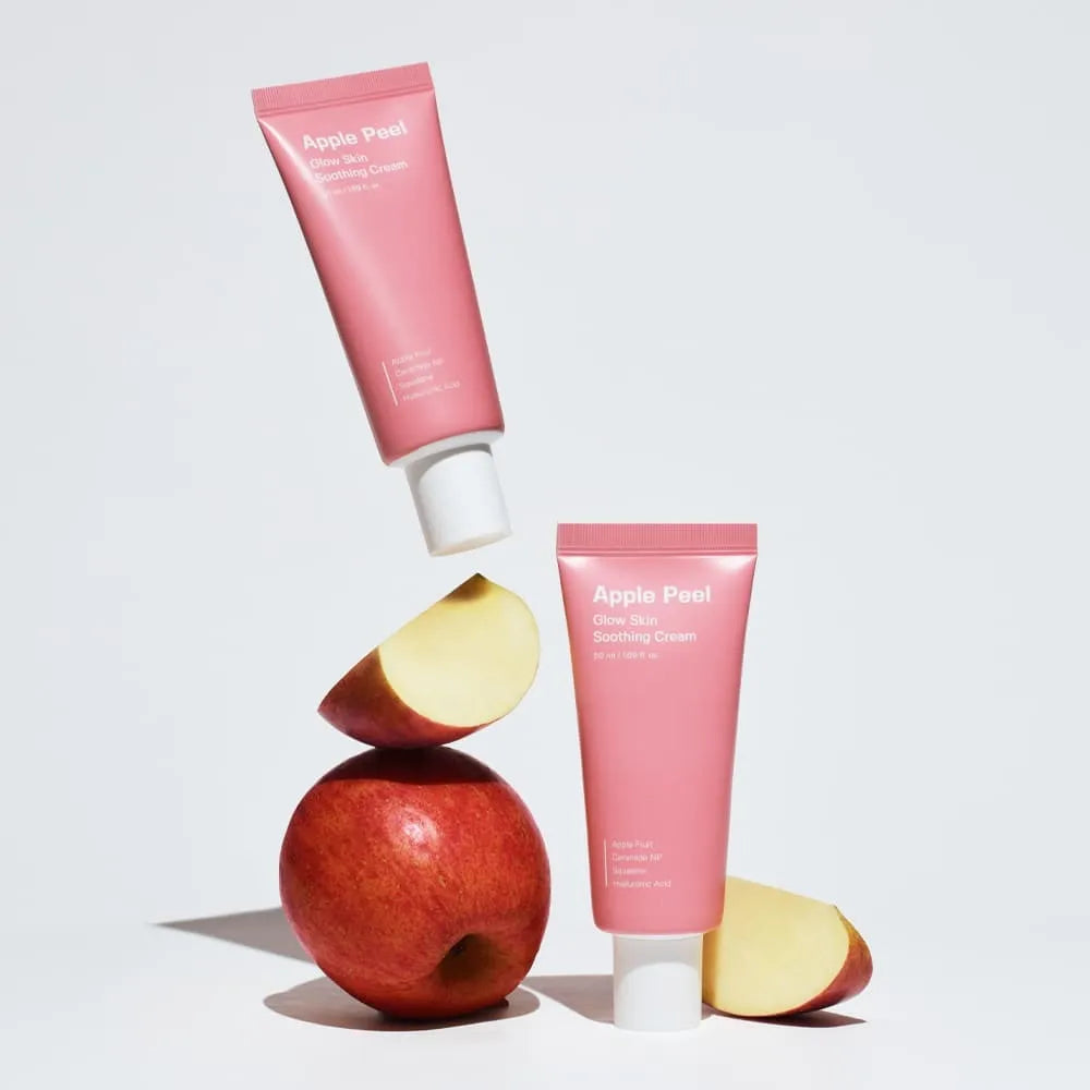 SUNGBOON EDITOR Apple Peel Glow Skin Soothing Cream 50ml, tube rose sur pommes, photo produit sur fond clair.