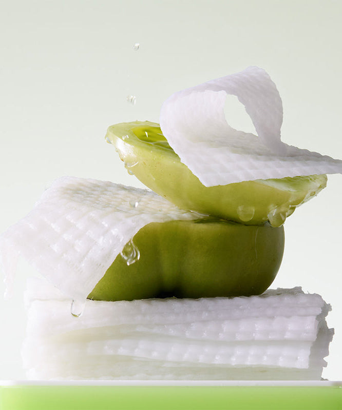 SUNGBOON EDITOR Green Tomato NMN Pore Peeling Jumbo Pad 60 Pads, marque sur pack, textures de pastilles vertes et blanches