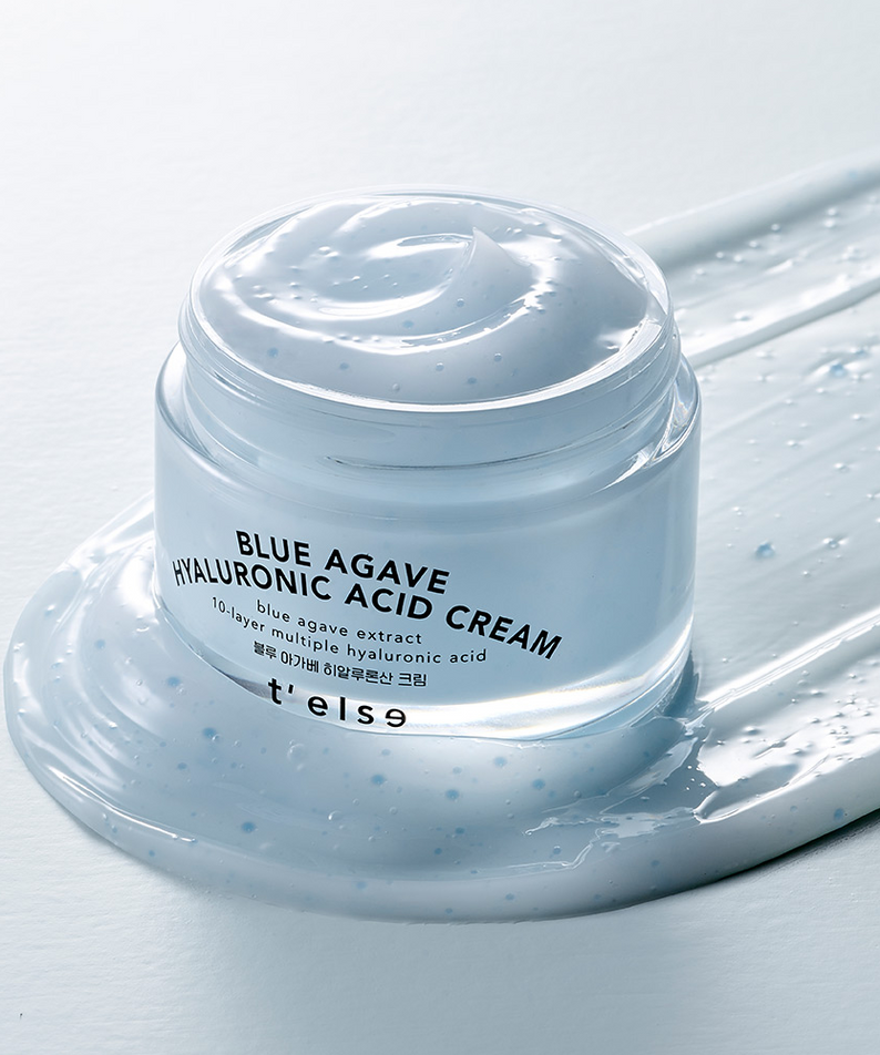 Crème hydratante T'ELSE Blue Agave Hyaluronic Acid Cream 50ml dans un pot transparent, sur fond texturé.