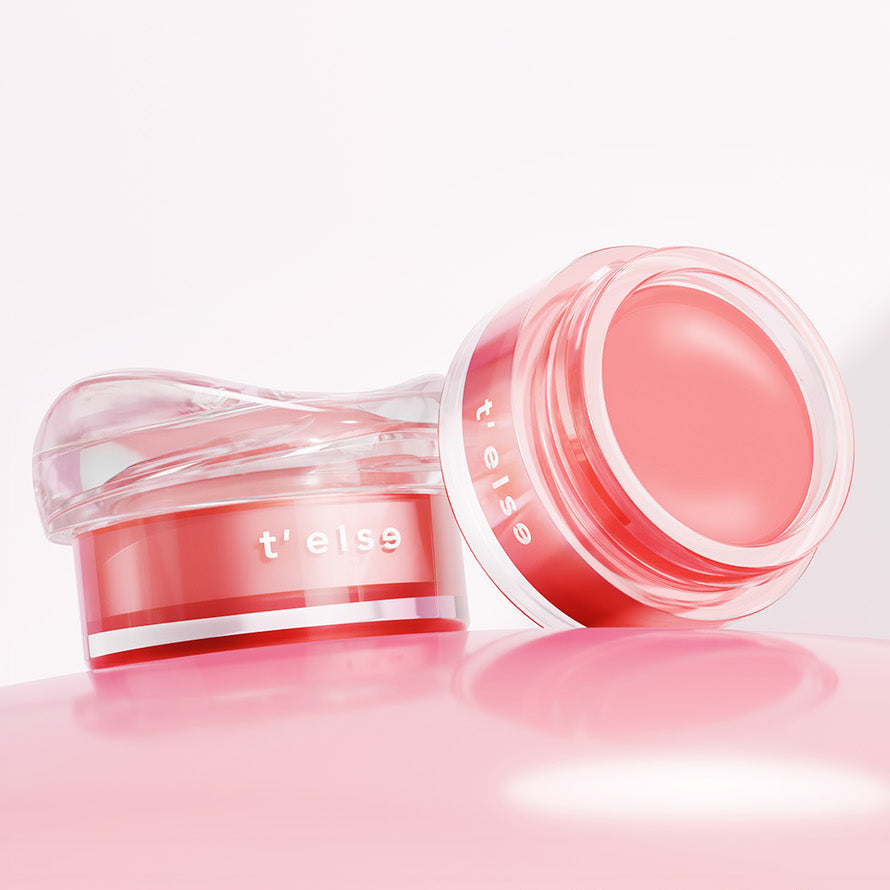T'ELSE Plumping Glow Jelly Pot 9g, pot de gelée rosée ouverte sur fond clair, marque T'ELSE en contexte beauté.