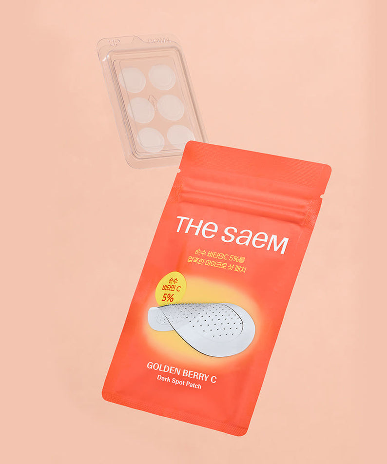 THE SAEM Golden Berry C Dark Spot Patch de THE SAEM, patch anti-taches dans un emballage orange sur fond beige