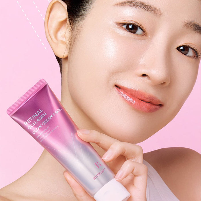 Décris l'image en français : TONY MOLY Retinal Collagen Glow Cream Pack 50ml, marque TONY MOLY, visage éclairé sur fond rose.