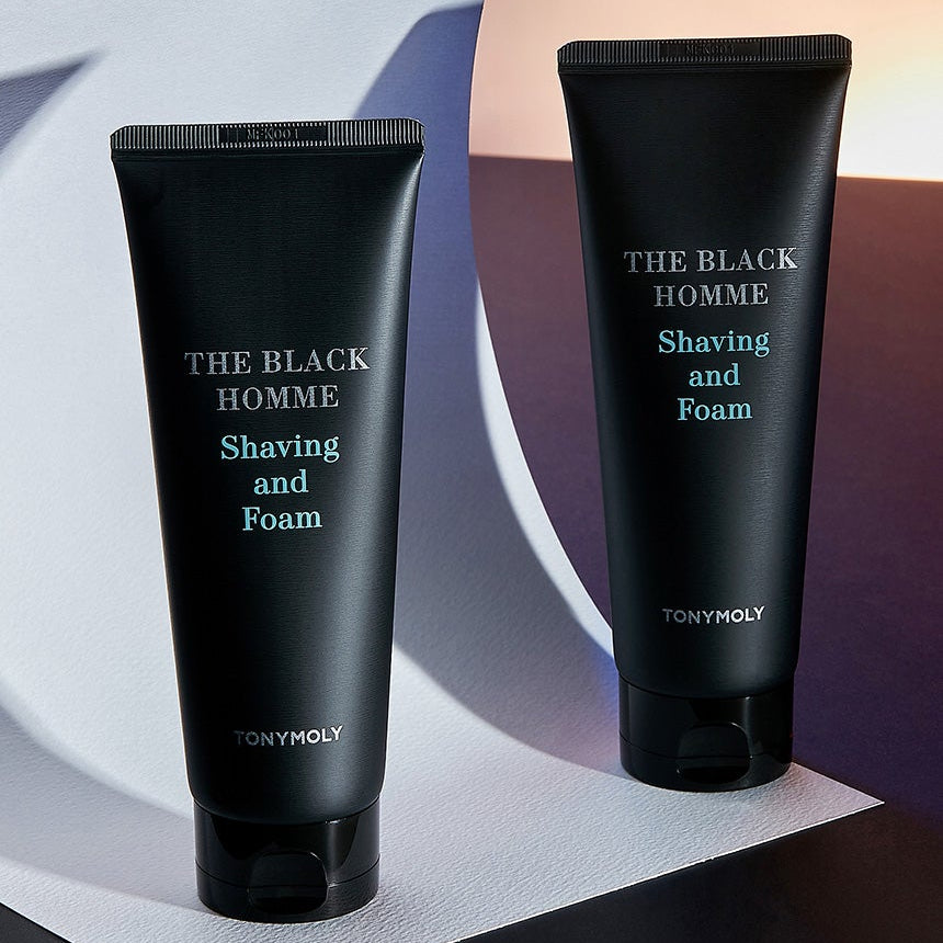 TONYMOLY The Black Homme Shaving & Foam 150g : deux tubes noirs sur fond clair, aspect premium, marque TONYMOLY visible.