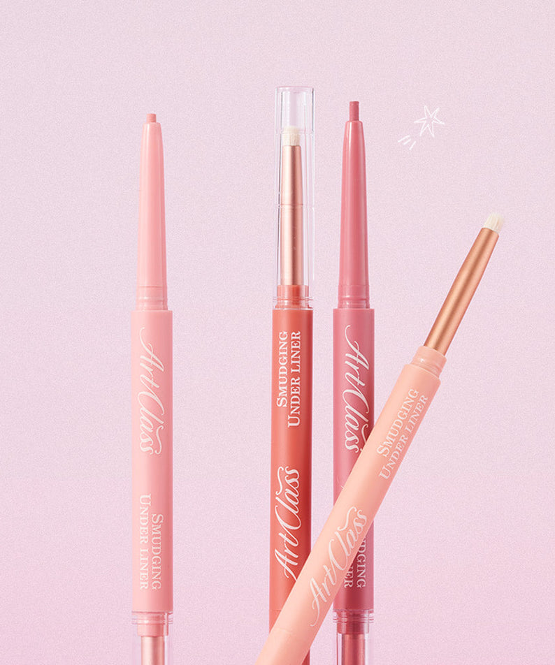 TOO COOL FOR SCHOOL Art Class Smudging Team Liner: crayons/liners rose corail sur fond rose, contexte maquillage artiste.