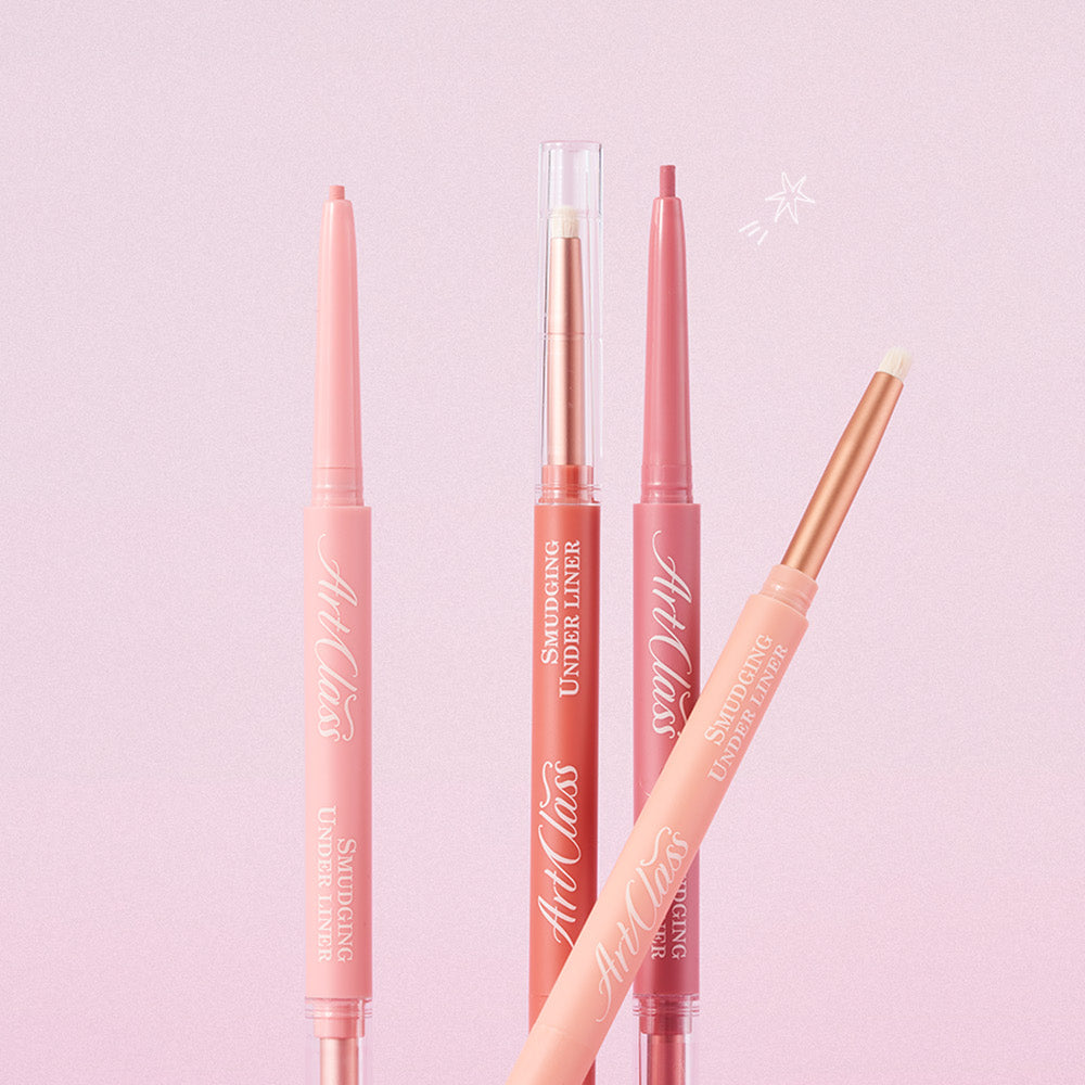 TOO COOL FOR SCHOOL Art Class Smudging Team Liner: crayons/liners rose corail sur fond rose, contexte maquillage artiste.