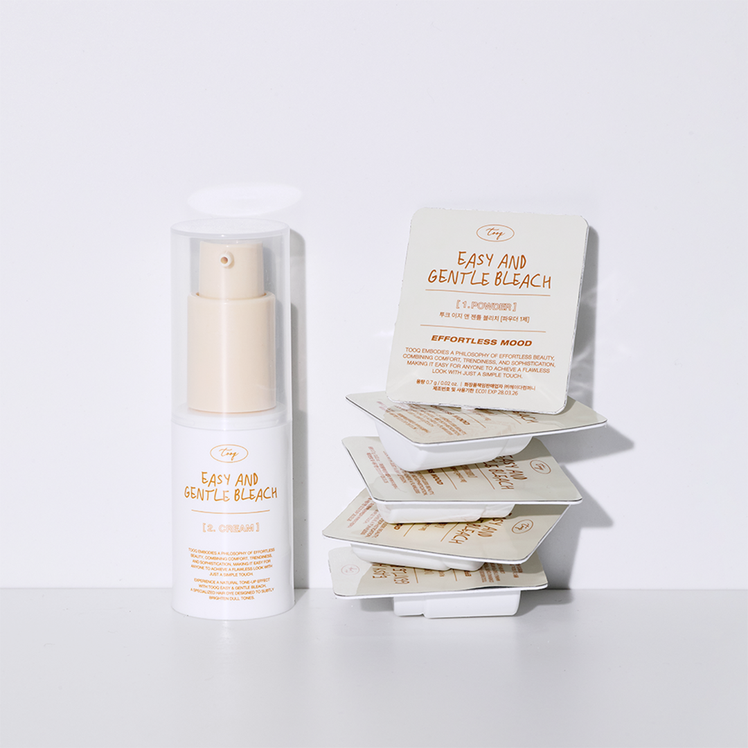 TOOQ Easy And Gentle Bleach de la marque TOOQ : flacon et boîtes, fond blanc, visuel produit en studio.