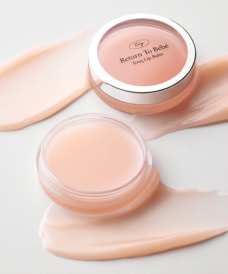 TOOQ Return To Bèbè Lip Balm – Baume à lèvres hydratant et nourrissant pour lèvres douces.
