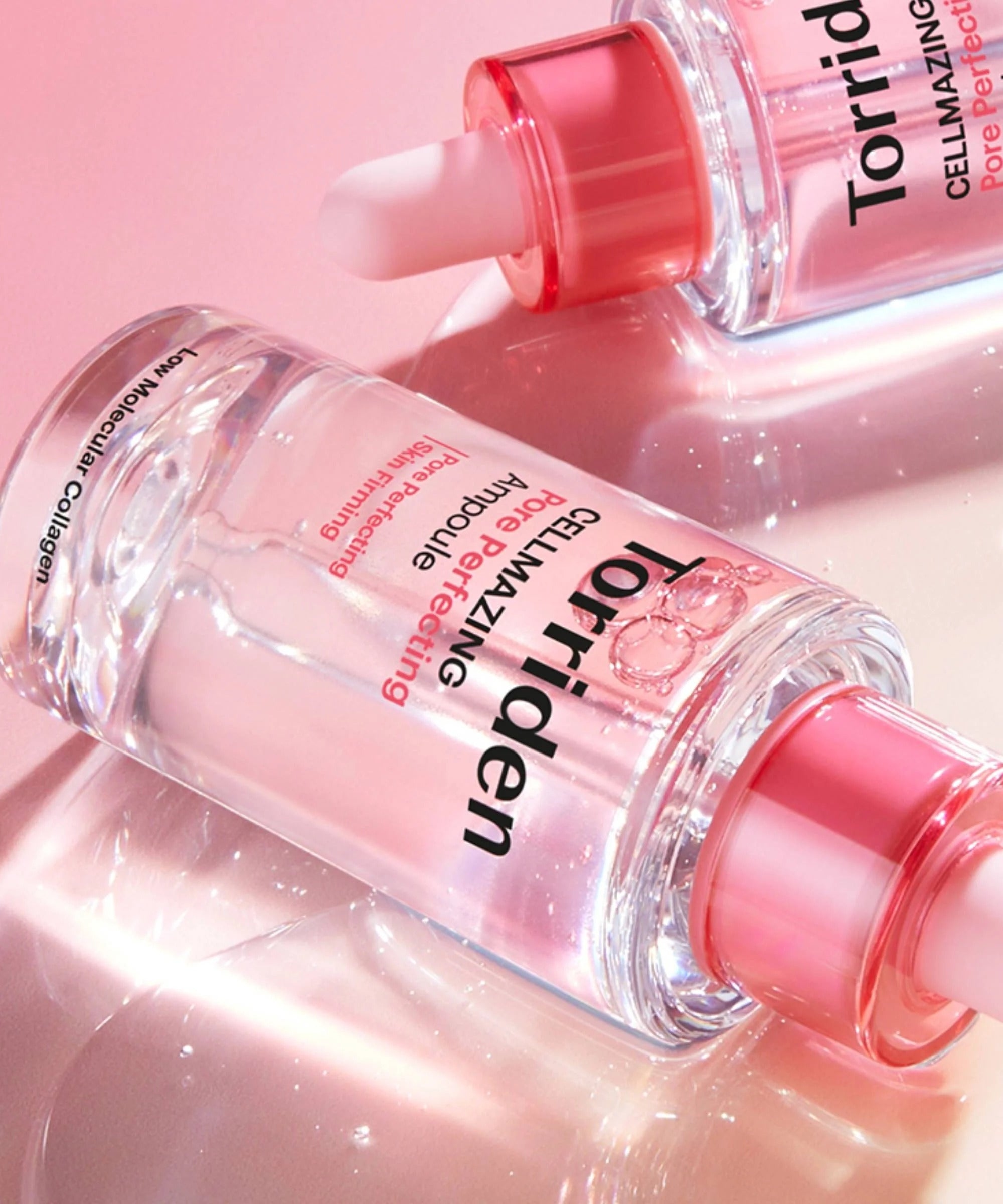 TORRIDEN Cellmazing Pore Perfecting Ampoule 30ml, flacons roses sur fond rose, vue rapprochée produit beauté.