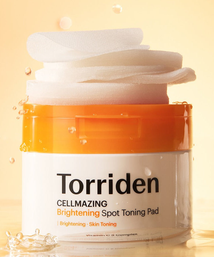 Décris l'image en français mentionnant TORRIDEN Cellmizing Vita C brightening Trace Toning Pads 70 sheets, pot sur fond doré