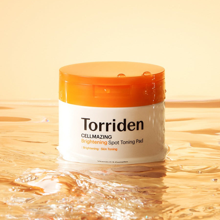 TORRIDEN Cellmizing Vita C brightening Trace Toning Pads 70 sheets, pot sur sable et lumière dorée, marquage visible.