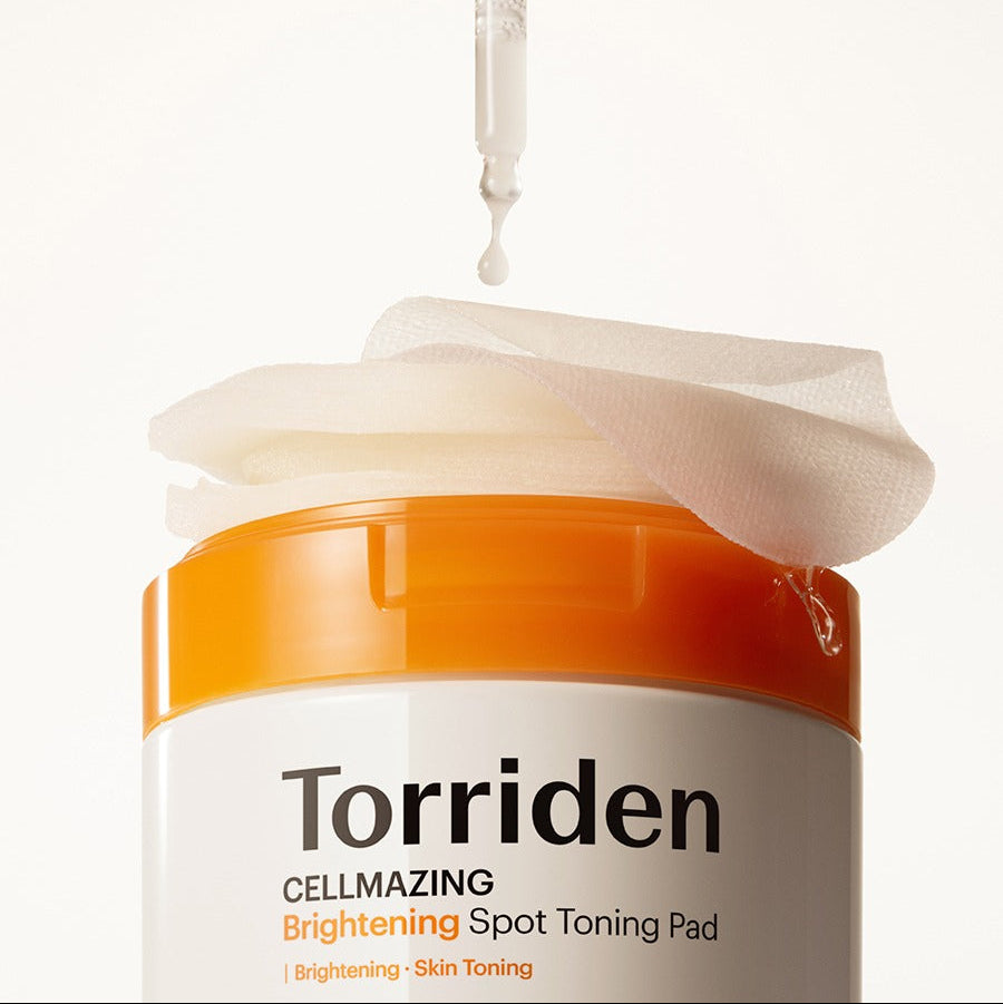 TORRIDEN Cellmizing Vita C brightening Trace Toning Pads 70 sheets, pot orange et pad blanc sur fond clair, image produit.