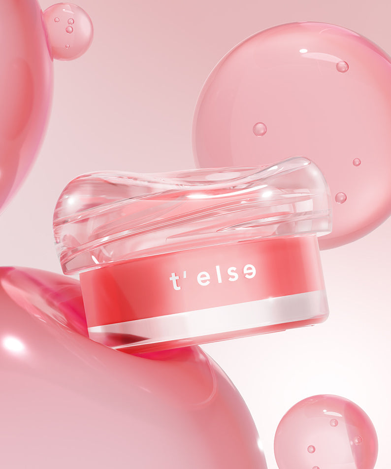 T'ELSE Plumping Glow Jelly Pot 9g, pot cosmétique rose pour éclat et volume, entouré de bulles roses transparentes.