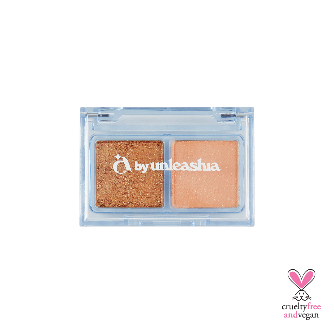UNLEASHIA Cotton Candy Face Palette de la marque UNLEASHIA, étui transparent avec duo maquillage, tons rose et doré