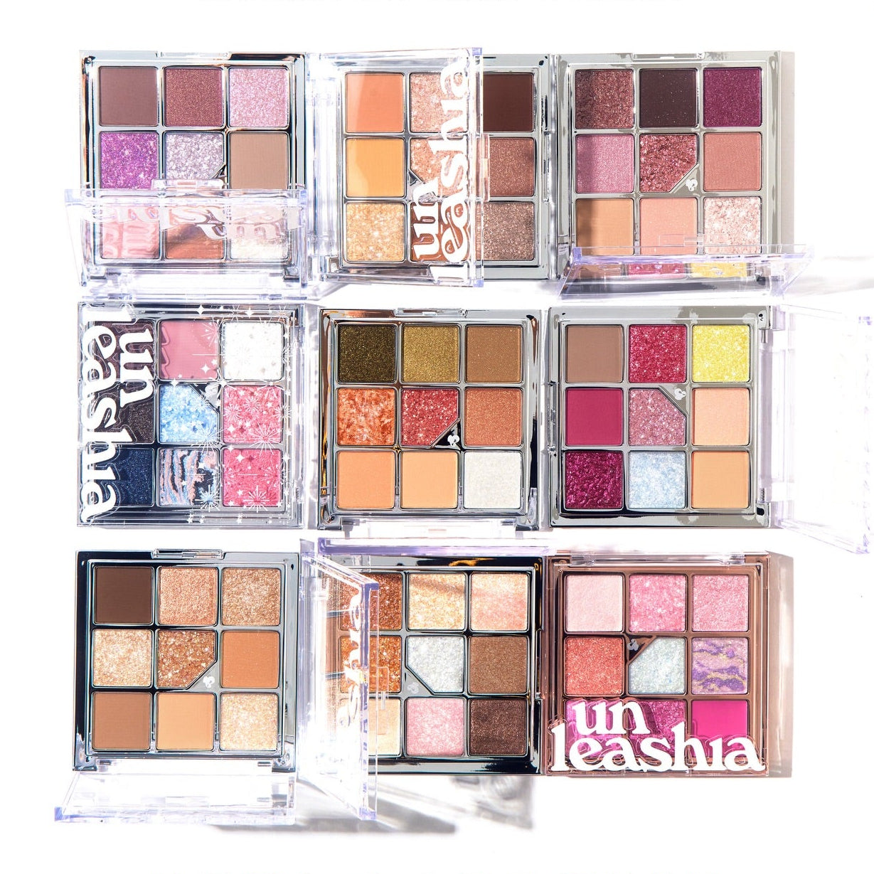 UNLEASHIA Glitterpedia Eye Palette : palette de fards brillants en étuis transparents, photos produit sur fond clair, Décris.