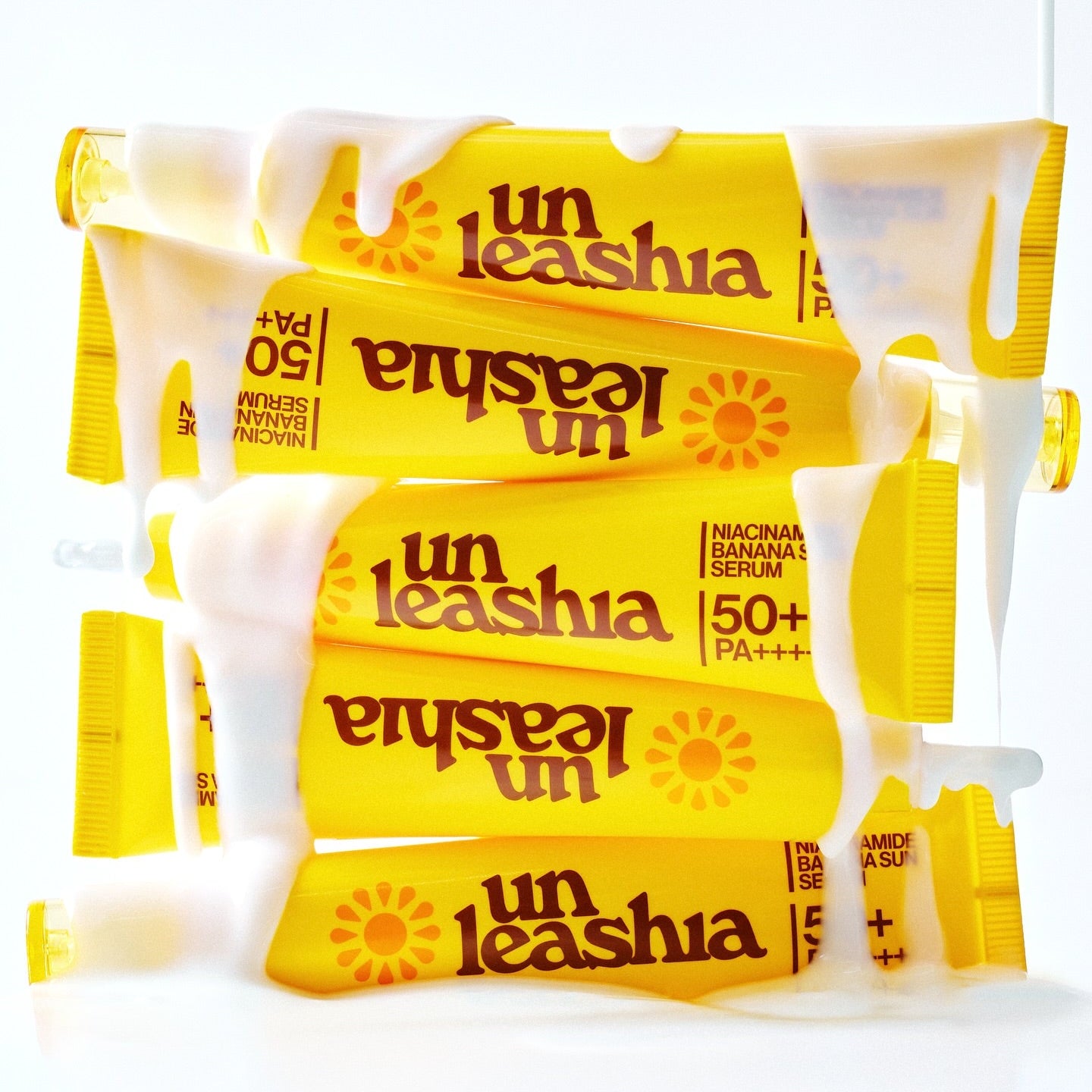 UNLEASHIA Niacinamide Banana Sun Serum 40ml de la marque UNLEASHIA, flacons jaune soleil sur fond clair