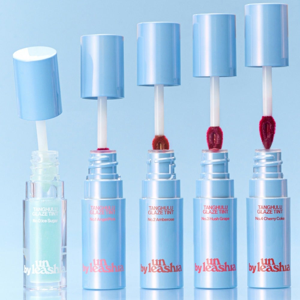 UNLEASHIA Tanghulu Glaze Tint, pack coloré sur fond bleu, la marque UNLEASHIA en vedette, tints brillant
