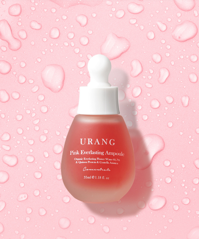 URANG Pink Everlasting Ampoule sur fond rose avec gouttes d'eau